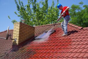 Moss cleaning on roof using chemical method