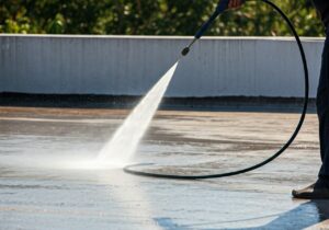 Pressure washing a concrete roof