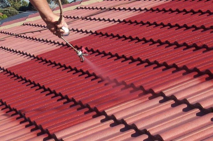 Applying Roof Restoration spray